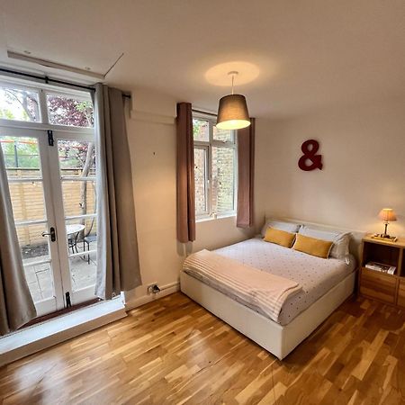 Charming 1-Bedroom Apartment Southfields, Londres Extérieur photo